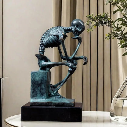 Bronze Thinker Sculpture - Abstract Rodin-Inspired Skeleton Art Statue for Home Decor and Halloween Skull Theme.