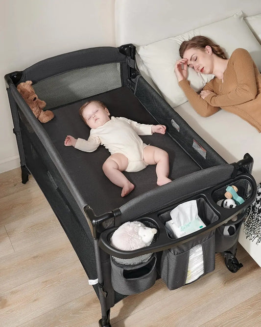 4-in-1 Baby Bassinet Bedside Sleeper with Changing Table, Playard & Wheels for Newborns